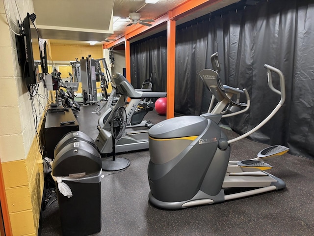 workout area featuring ceiling fan