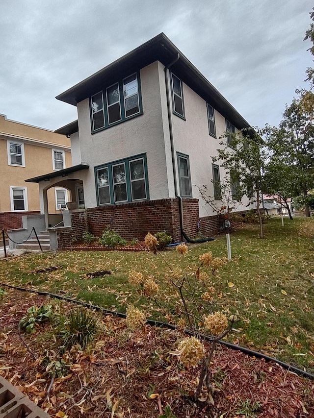 exterior space with a front lawn