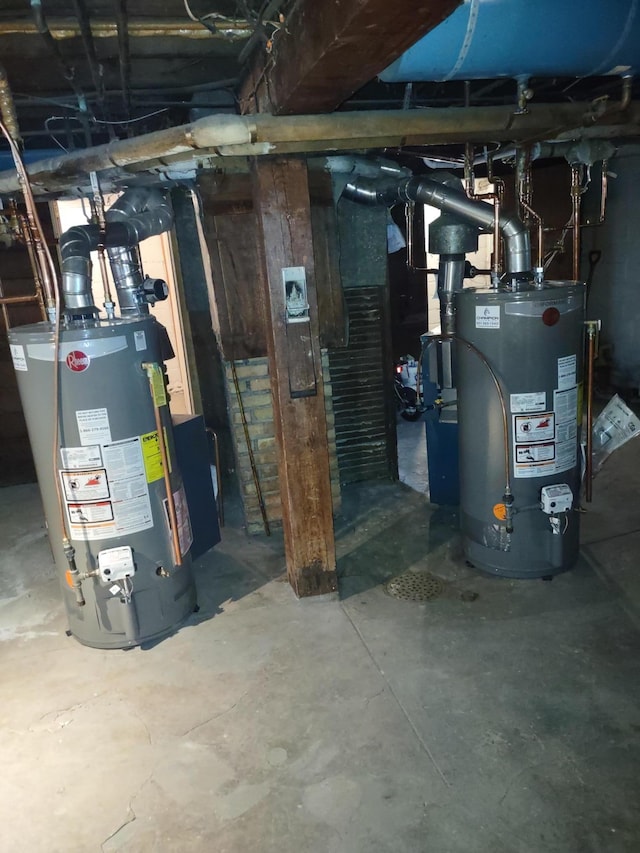 utility room featuring gas water heater