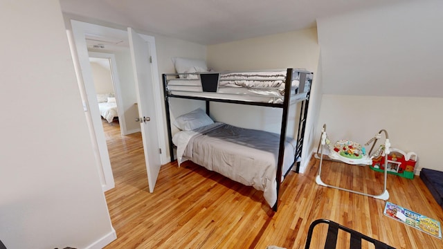 bedroom with light hardwood / wood-style flooring