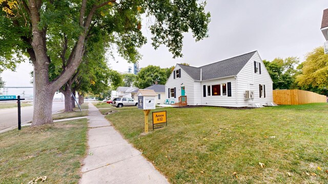 view of front facade featuring a front yard