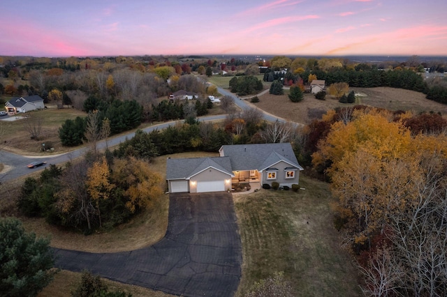 view of aerial view at dusk