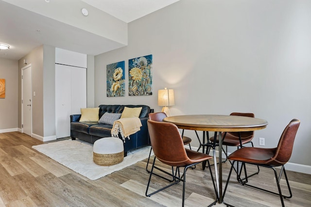 dining space featuring light hardwood / wood-style flooring