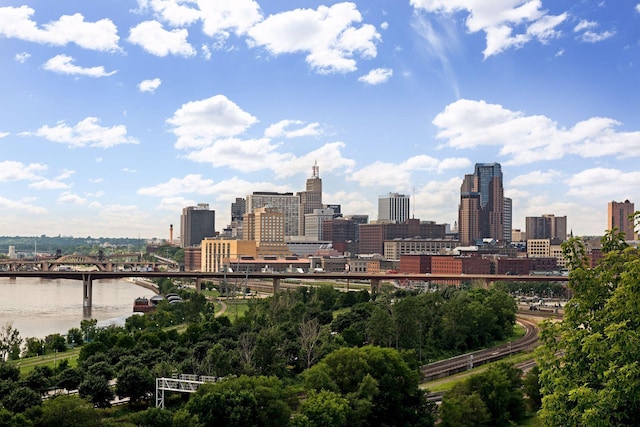 property's view of city featuring a water view