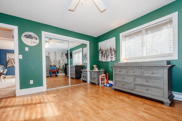 miscellaneous room with hardwood / wood-style floors and ceiling fan