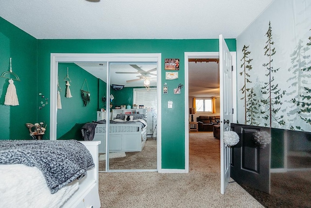 carpeted bedroom with a closet