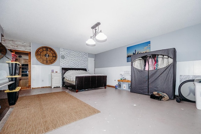 bedroom with concrete floors