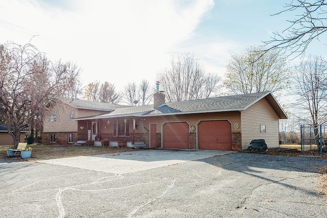 view of front of home featuring a garage