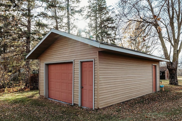 view of outbuilding featuring a garage