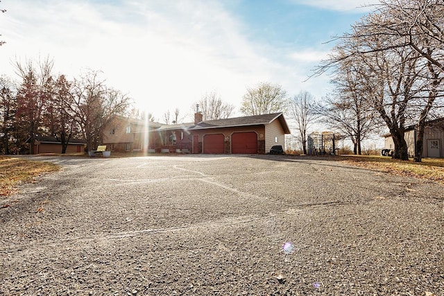 exterior space featuring a garage