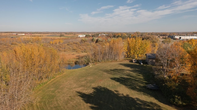 birds eye view of property with a rural view and a water view