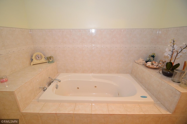 bathroom featuring tiled bath