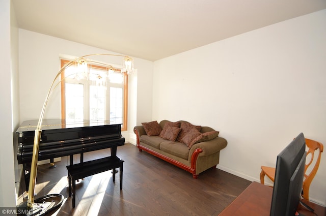 sitting room featuring dark wood-type flooring