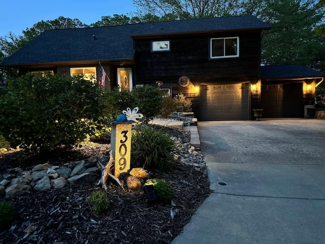 view of front of property with a garage