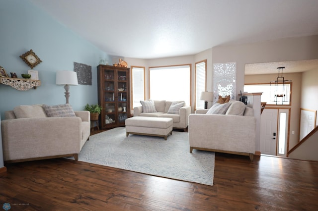 living room with dark hardwood / wood-style flooring