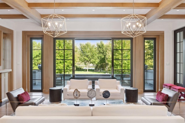 interior space with beam ceiling and a chandelier