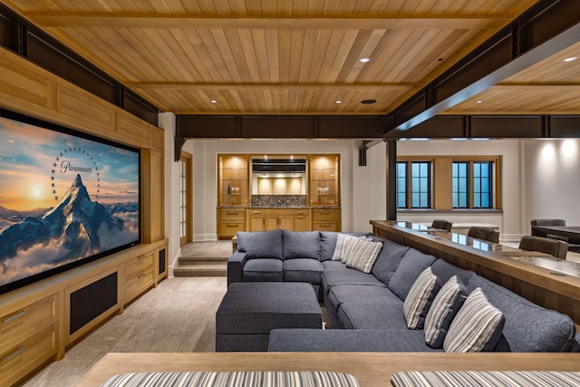 cinema featuring beam ceiling, wooden ceiling, and light wood-type flooring