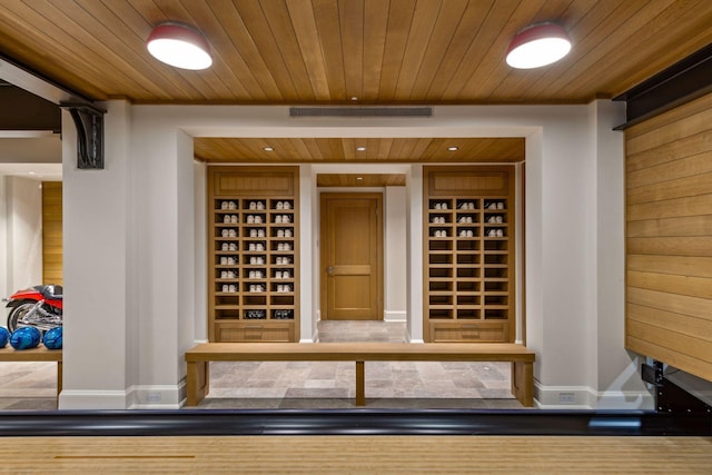 wine area with wooden ceiling