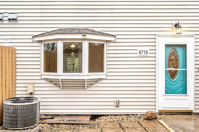 property entrance featuring central air condition unit