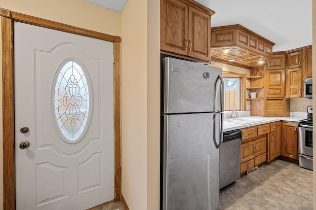 kitchen featuring appliances with stainless steel finishes and sink