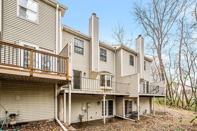 rear view of house with a patio