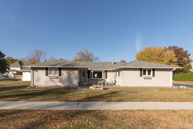 single story home with a patio area, a front lawn, and cooling unit