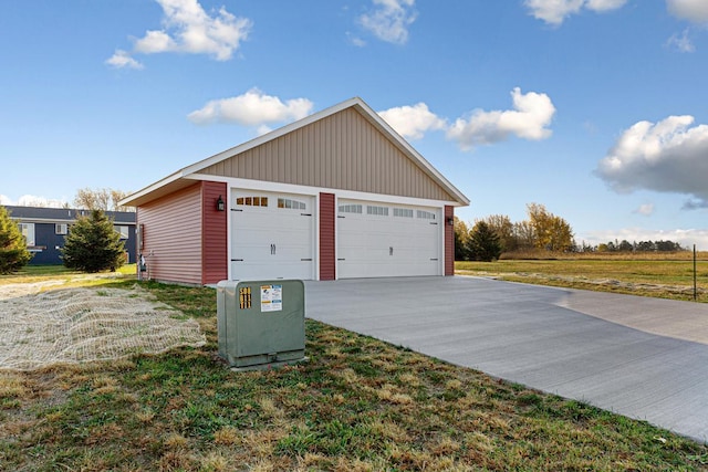 garage with a lawn