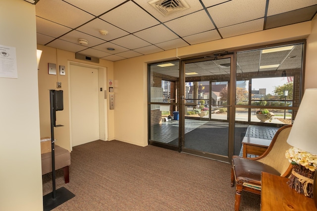 317 6th Ave SW Unit 501, Rochester, MN 55902 - entryway featuring a paneled ceiling, carpet, and elevator