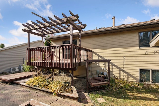 wooden terrace featuring a pergola