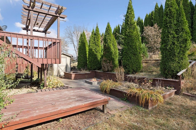 wooden terrace featuring a pergola