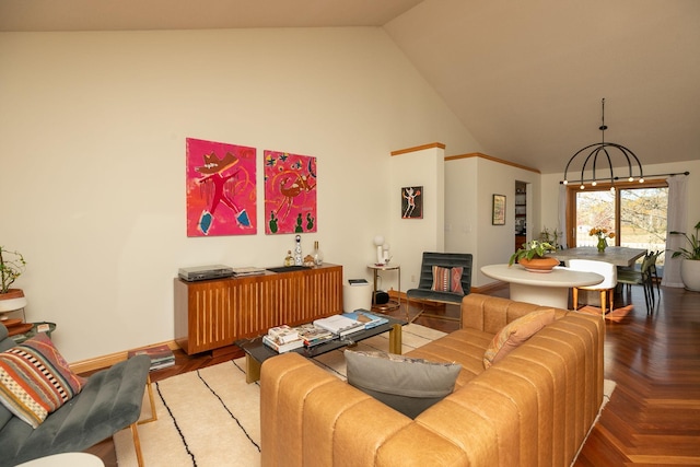 living room with high vaulted ceiling