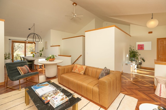 living room featuring parquet flooring, high vaulted ceiling, and ceiling fan