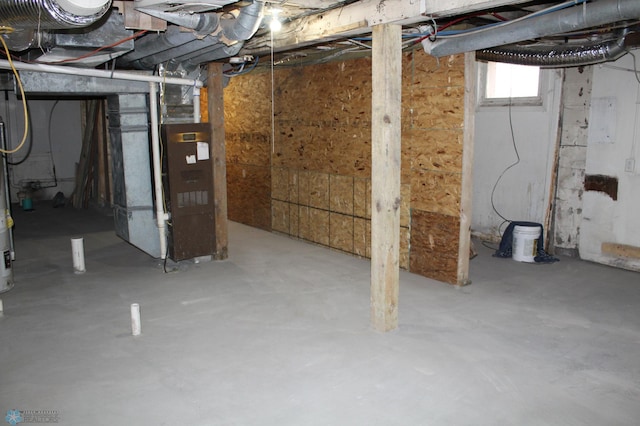 basement featuring heating unit