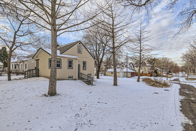 exterior space featuring a storage shed