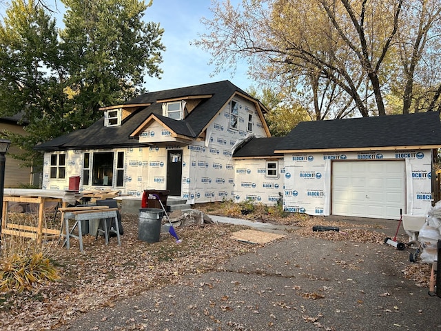 view of front of property with a garage