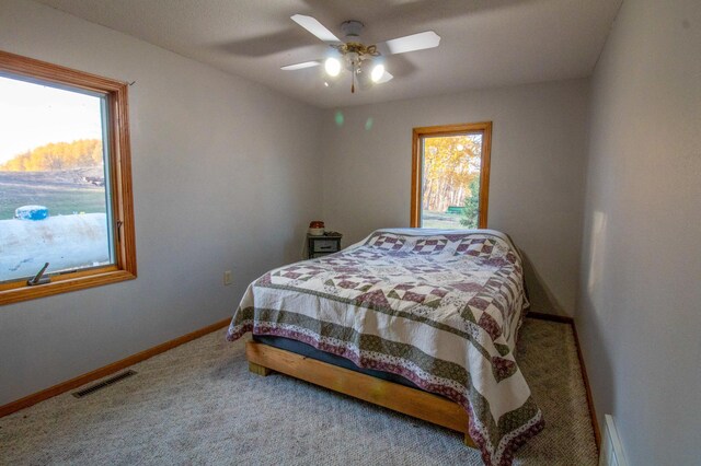 bedroom featuring carpet and ceiling fan