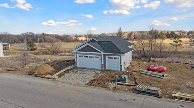 view of front of house featuring a rural view