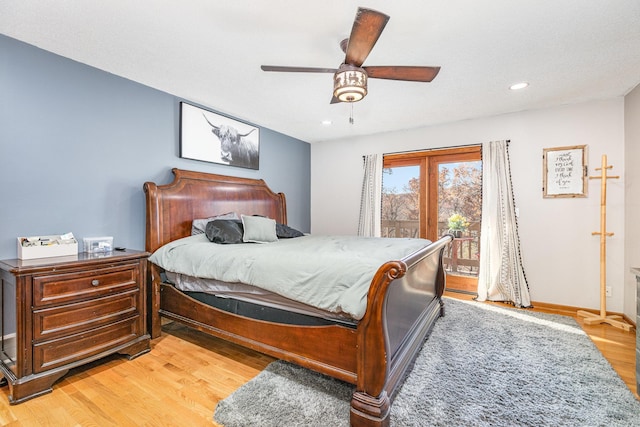 bedroom featuring light hardwood / wood-style flooring and ceiling fan