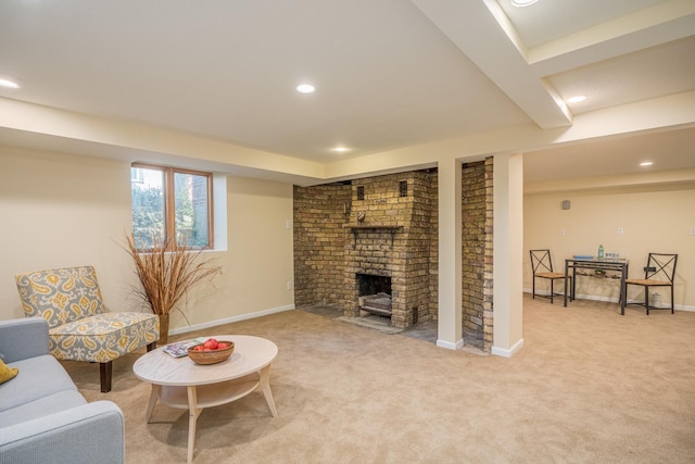 living room with light carpet and a brick fireplace