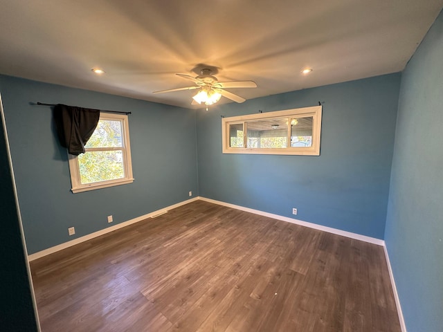 1031 Willmar Ave SW, Willmar, MN 56201 - spare room featuring baseboards, a ceiling fan, wood finished floors, and recessed lighting