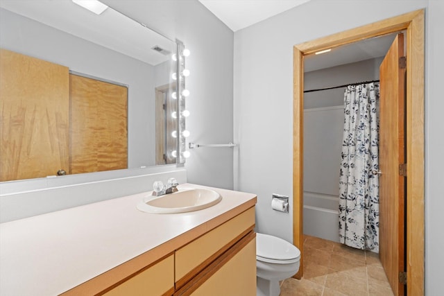 full bathroom featuring vanity, shower / bath combination with curtain, and toilet