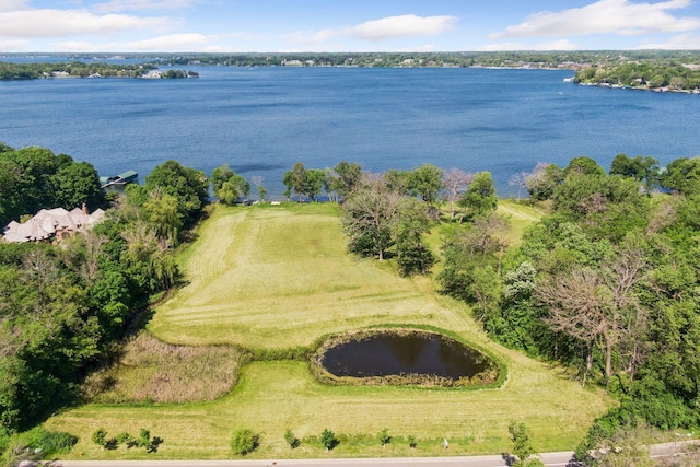 birds eye view of property featuring a water view