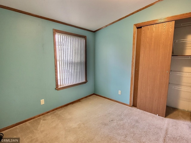 13658 Clearwater Forest Cir, South Haven, MN 55382 - unfurnished bedroom featuring carpet floors, crown molding, multiple windows, and a closet