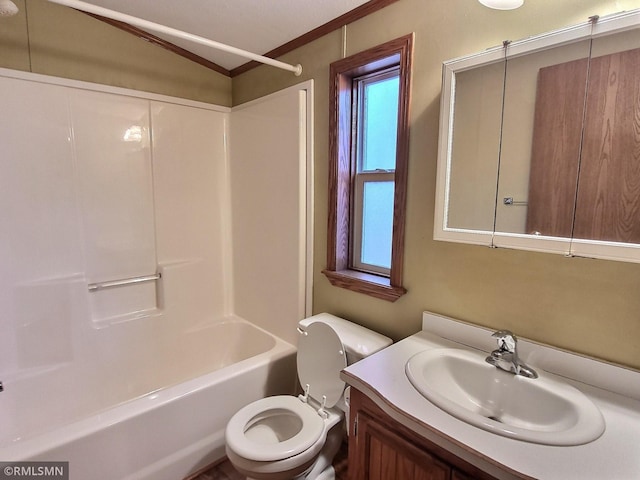 full bathroom with vanity, toilet, crown molding, and shower / washtub combination