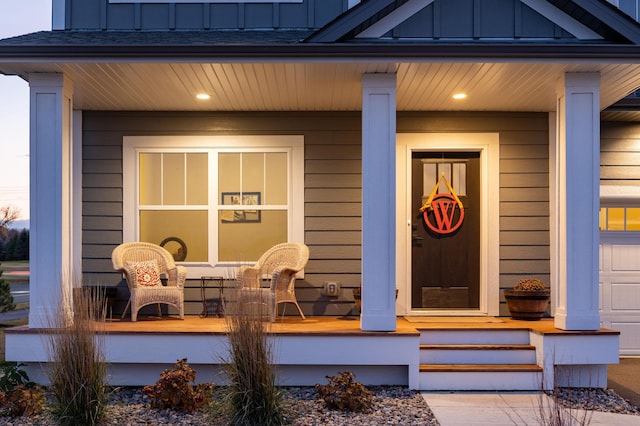 property entrance with covered porch