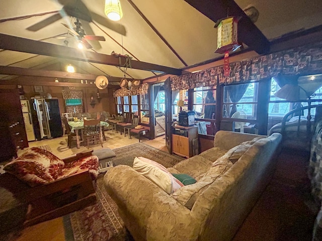 living room featuring beam ceiling, high vaulted ceiling, and ceiling fan