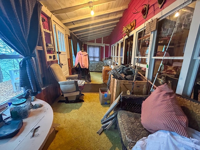 miscellaneous room featuring wooden ceiling, carpet floors, and vaulted ceiling with beams