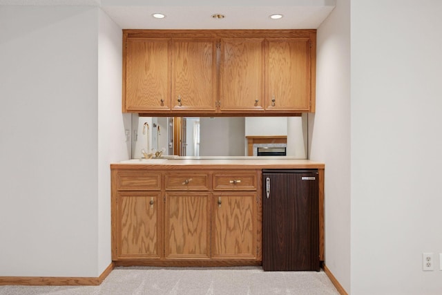 bar with recessed lighting, baseboards, and light carpet