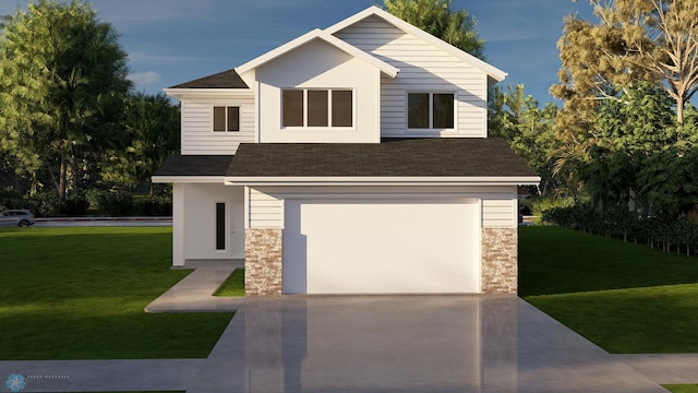 view of front of home featuring a garage and a front lawn