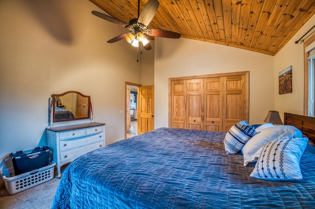 carpeted bedroom with a closet, high vaulted ceiling, ceiling fan, and wood ceiling